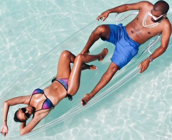 Couple in a clear boat in Turks and Caicos